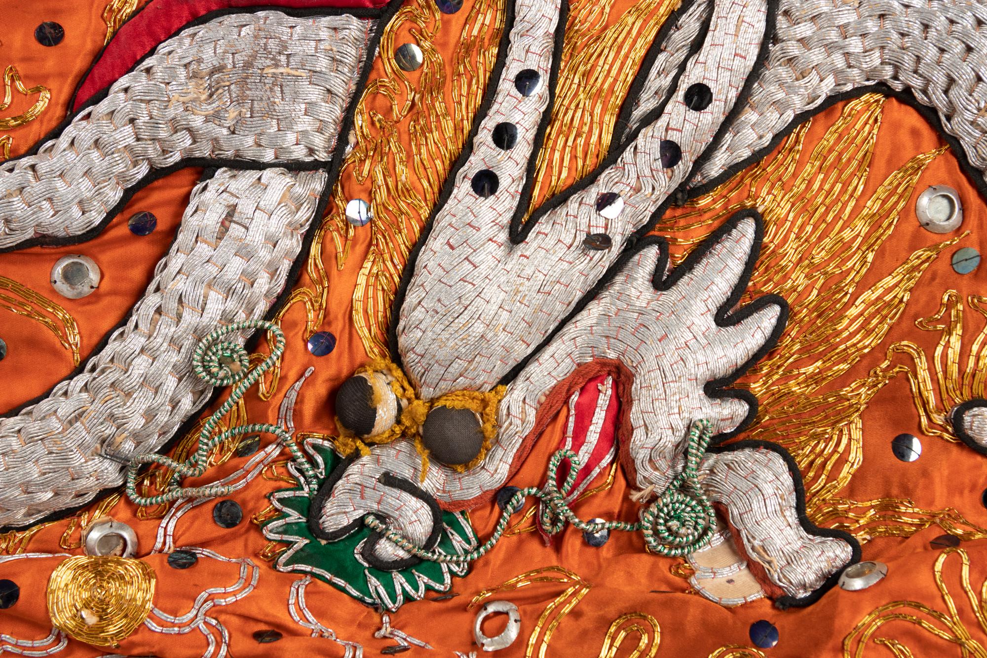 Two Chinese Orange Ground Embroidered Silk Theatrical Robes and A Cape