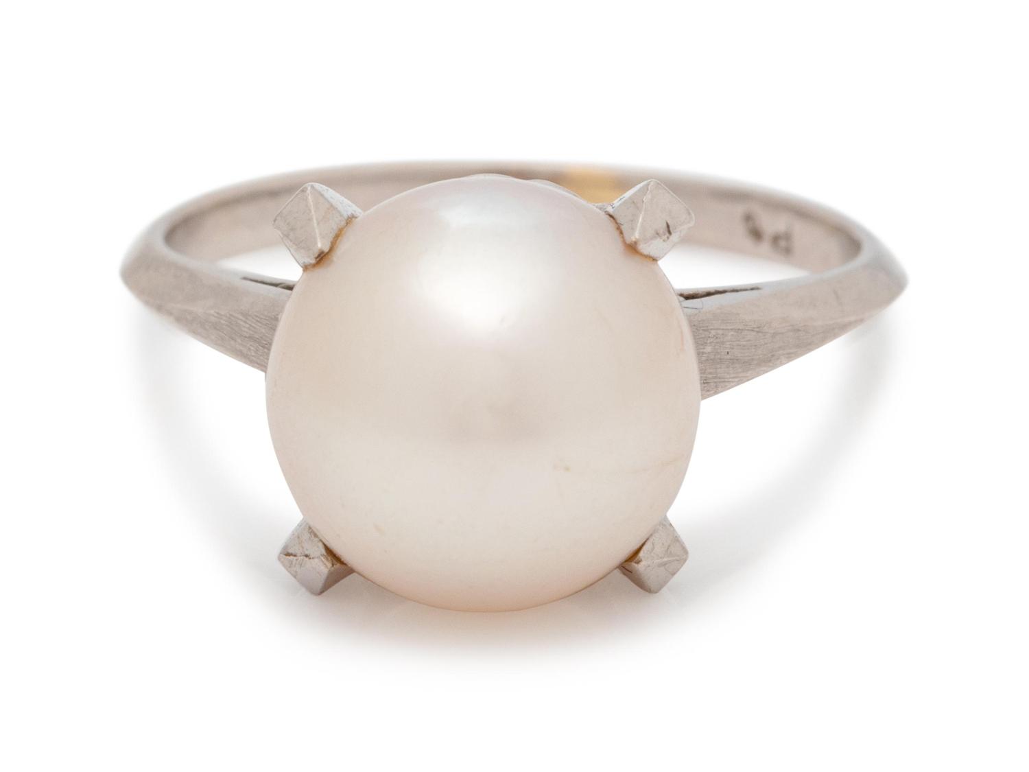 A Platinum and Cultured Pearl Ring,