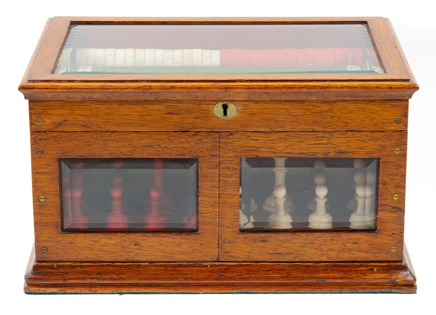 A Victorian Oak Games Compendium Height 7 3/4 x width 13 3/4 x depth 9 5/8 inches. — 19TH CENTURY