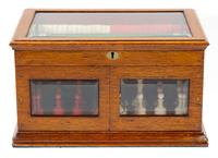 A Victorian Oak Games Compendium Height 7 3/4 x width 13 3/4 x depth 9 5/8 inches. — 19TH CENTURY