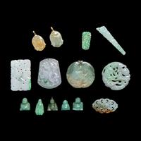 Fourteen Chinese Jadeite and Jade Pendants