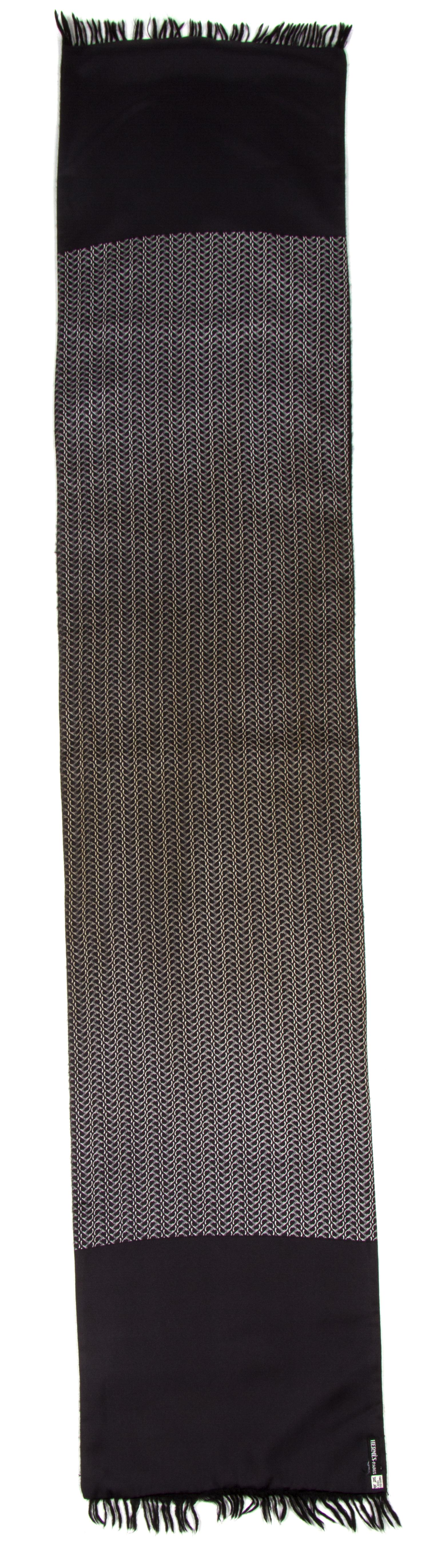 An Hermes Black Silk and Cashmere Muffler, 54" x 11".