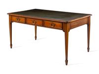 An Edwardian Leather-Inset Mahogany Writing Table