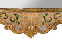 A Venetian Reverse-Painted Glass Mirror
