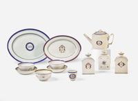 A collection of twelve Chinese Export armorial porcelain tablewares, late 18th / early 19th century