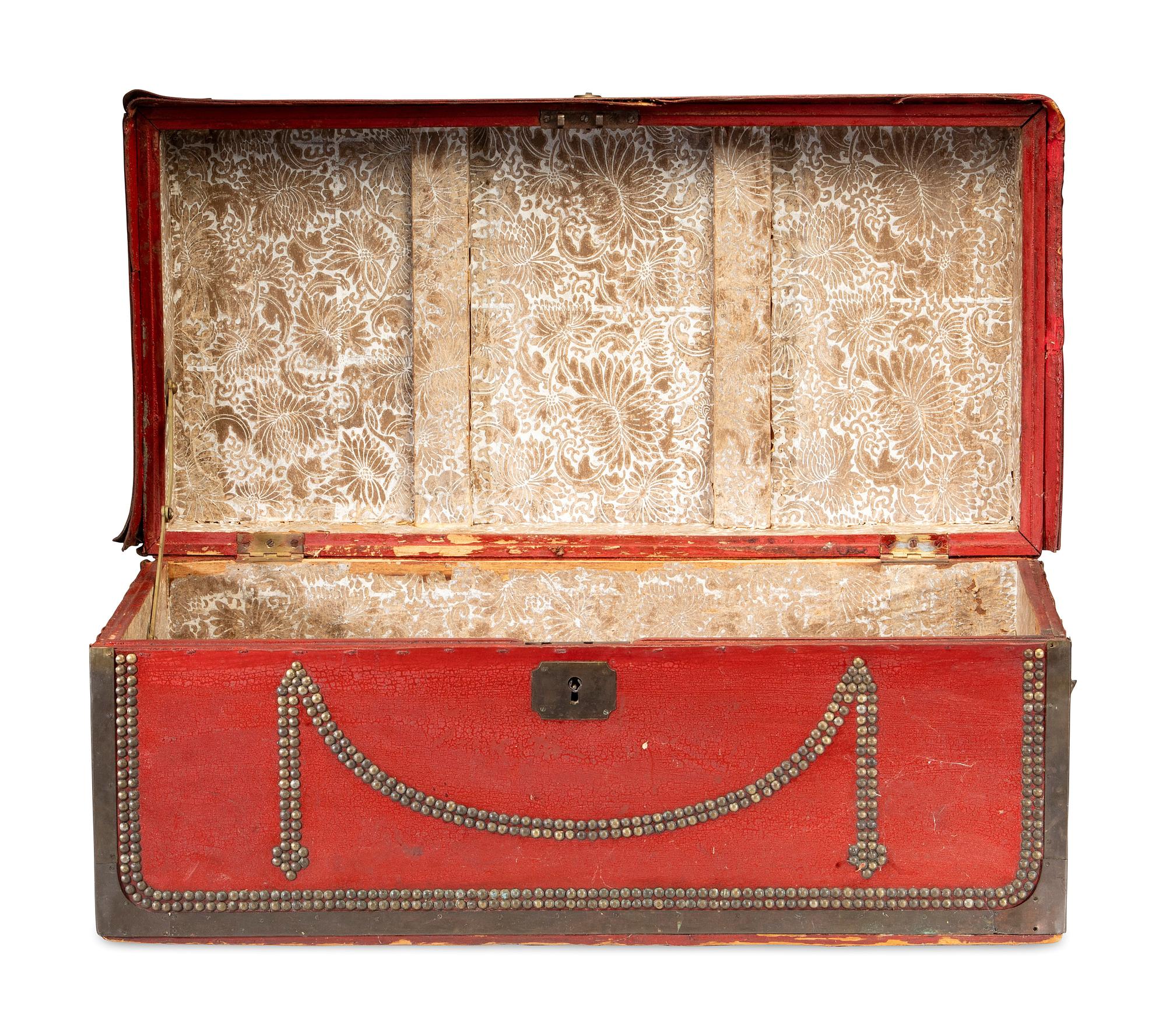 A China Trade Camphorwood Red Leather Clad and Brass Tack-Decorated Trunk