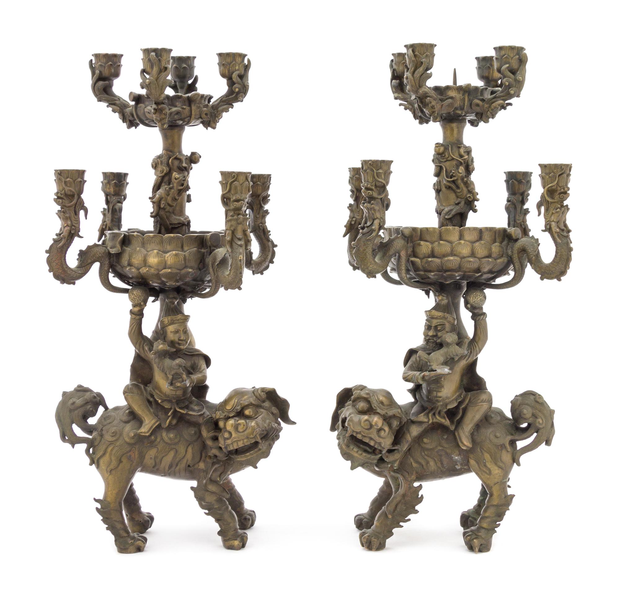 A Pair of Chinese Bronze Foreigner Candelabra 17TH/18TH CENTURY Height 20 inches. — 17TH/18TH CENTURY