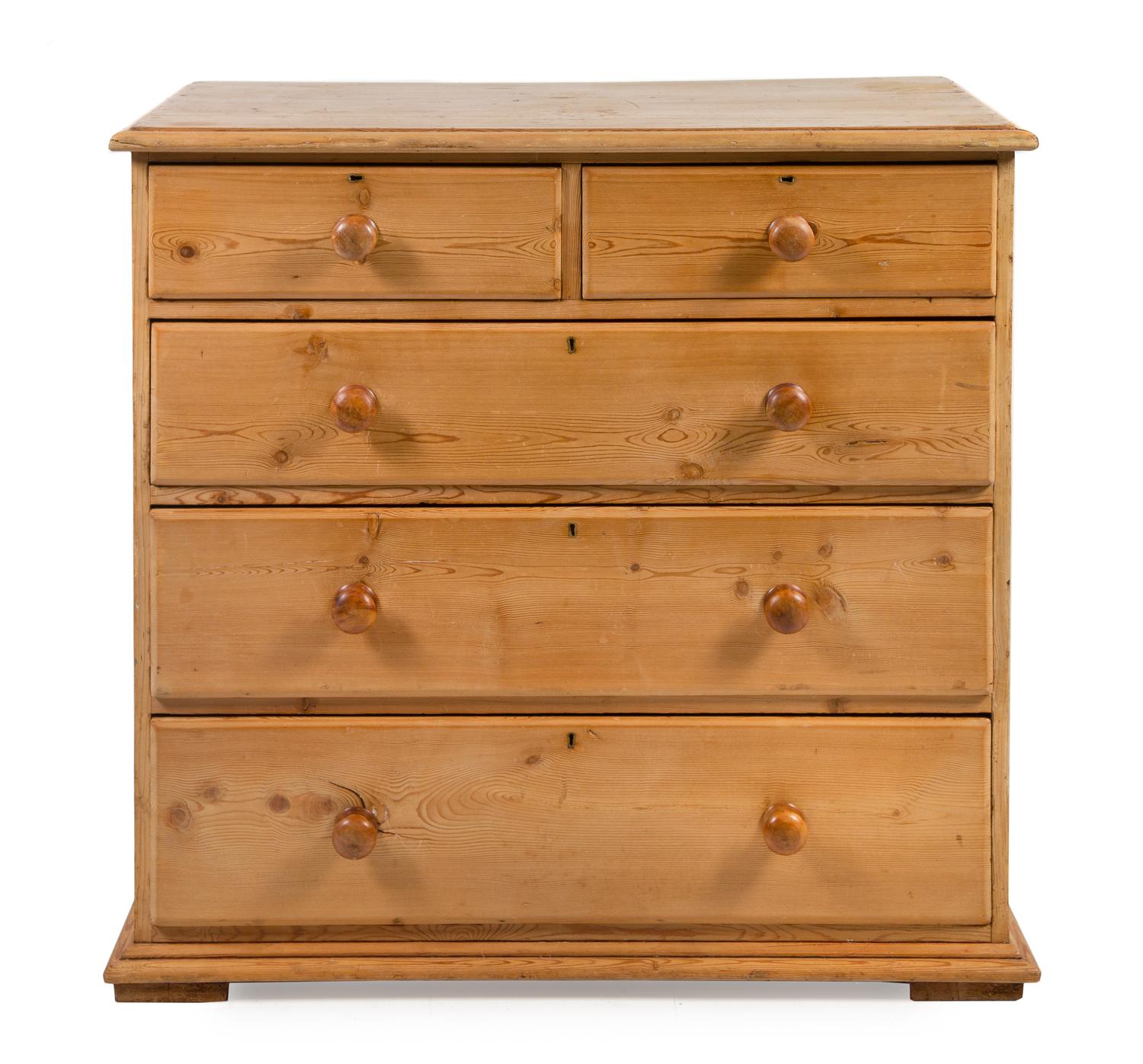 An English Pine Chest of Drawers Height 41 3/4 x width 43 1/4 x depth 21 1/4 inches. — 19TH CENTURY