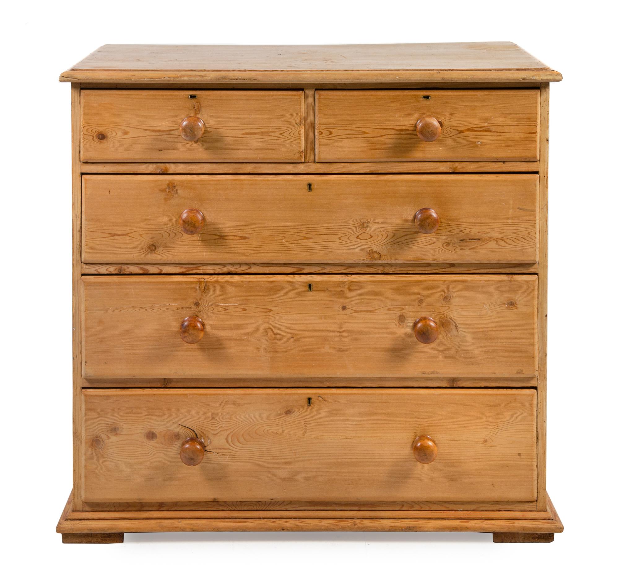 An English Pine Chest of Drawers Height 41 3/4 x width 43 1/4 x depth 21 1/4 inches. — 19TH CENTURY