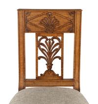 A Pair of Charles X Fruitwood Side Chairs