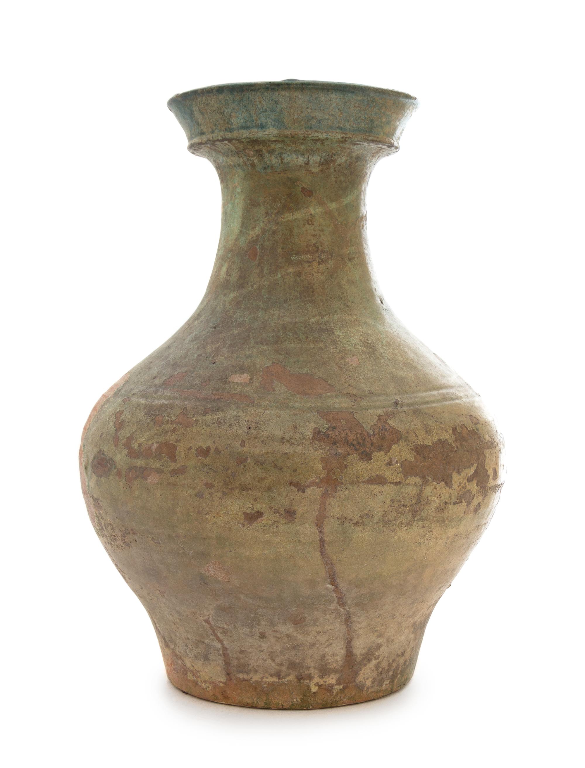A Chinese Green Glazed Pottery Hu Height 15 inches. — HAN DYNASTY (206 B.C. - A.D. 220)