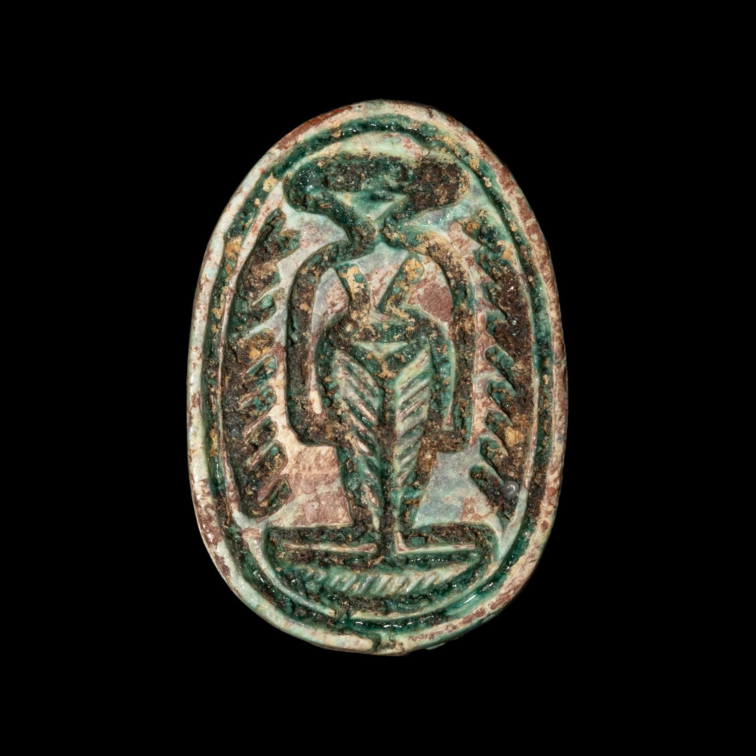 An Egyptian Faience Scarab