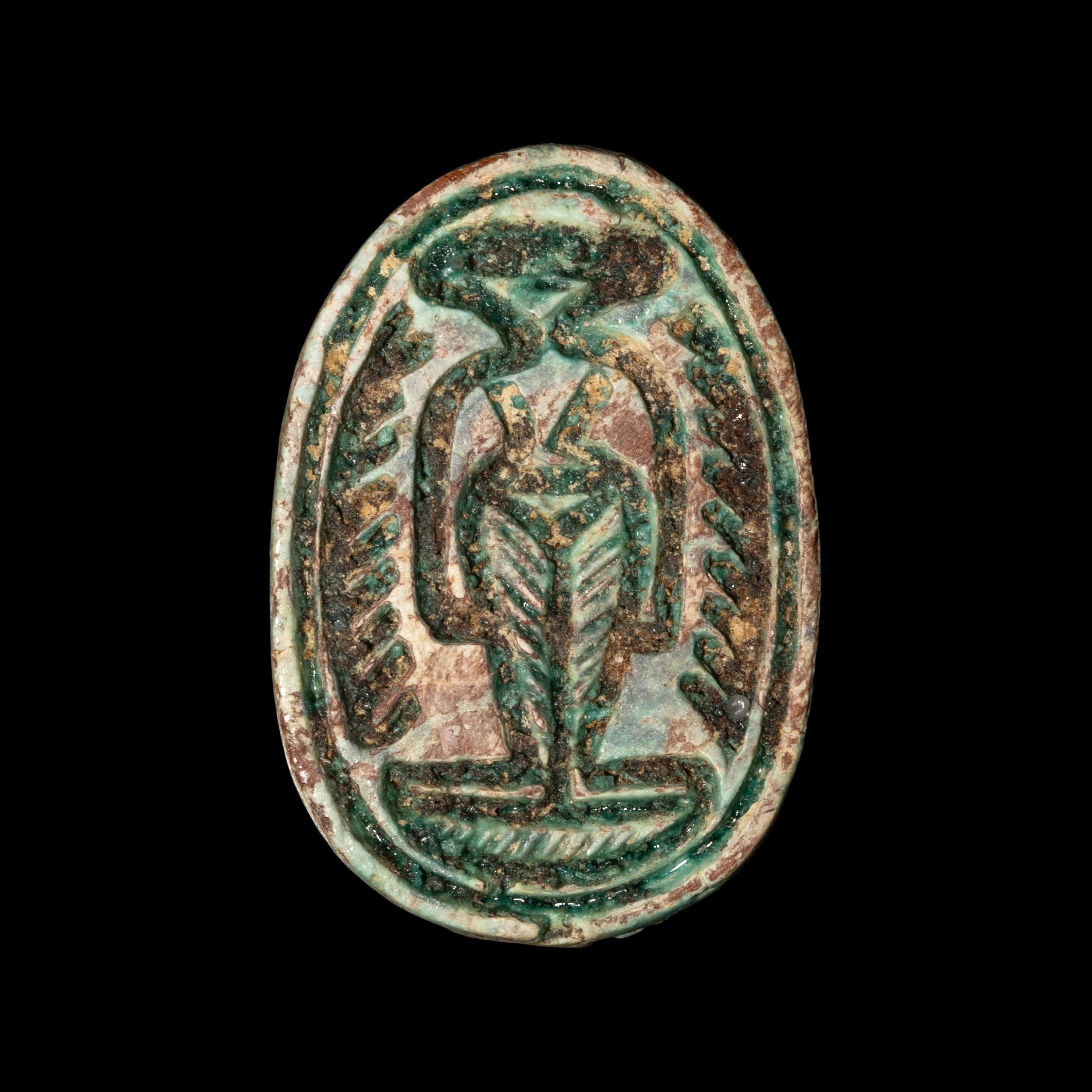 An Egyptian Faience Scarab