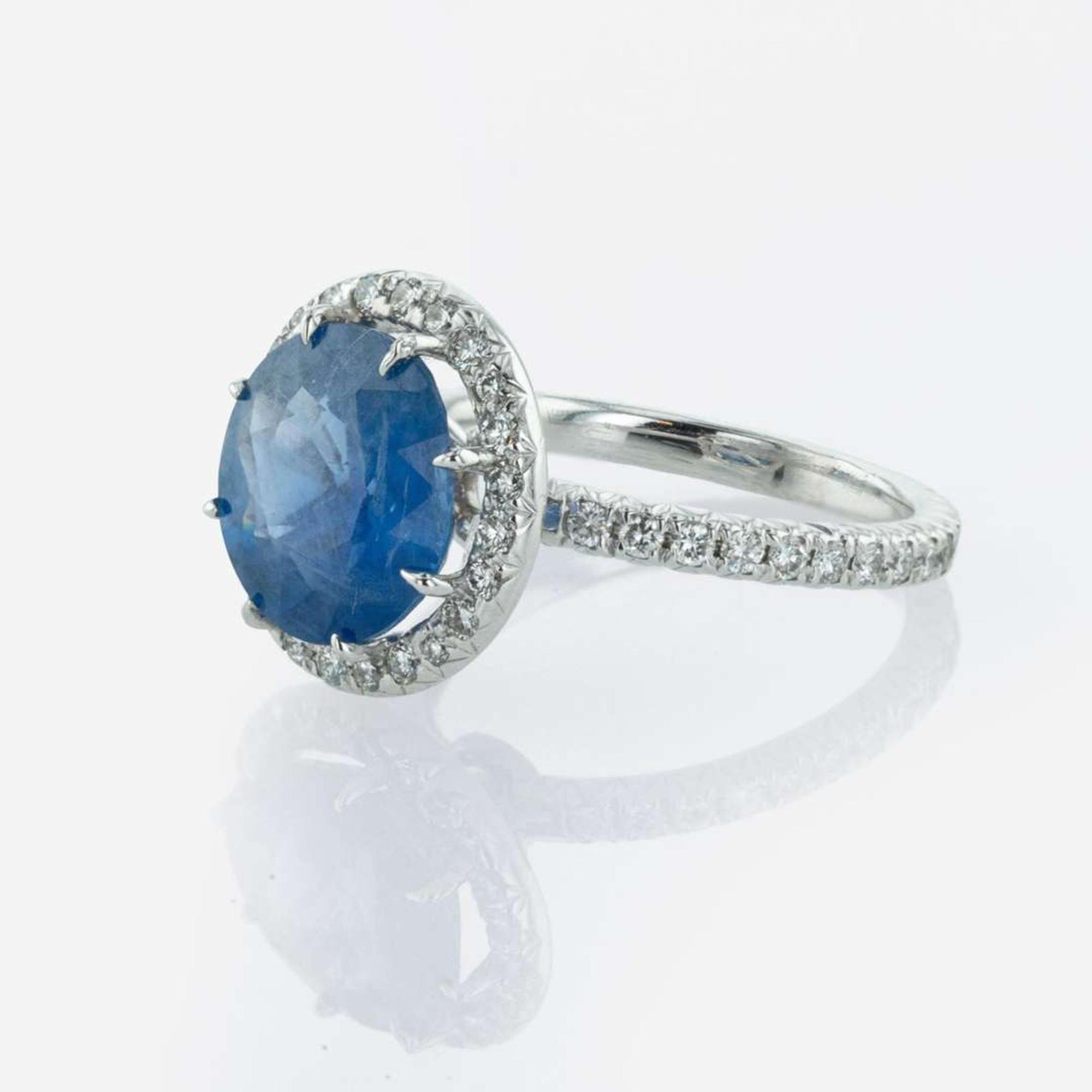A Sapphire, Diamond, and Platinum Ring