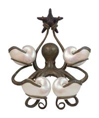An Iron and Shell Mounted Sconce