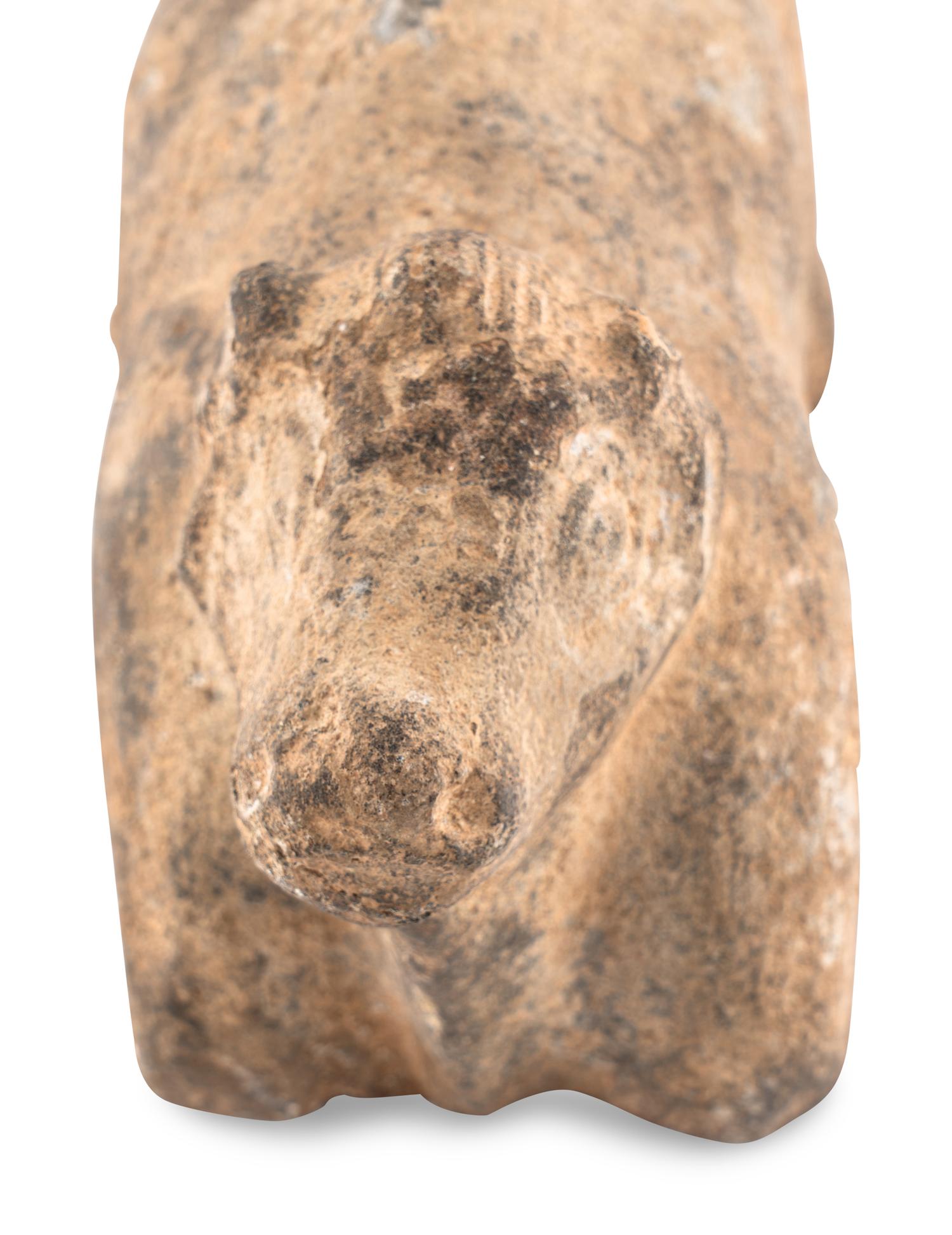 A Syro-Hittite Stone Figure of a Recumbent Bull