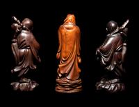 Seven Chinese Carved Hardwood Figures
