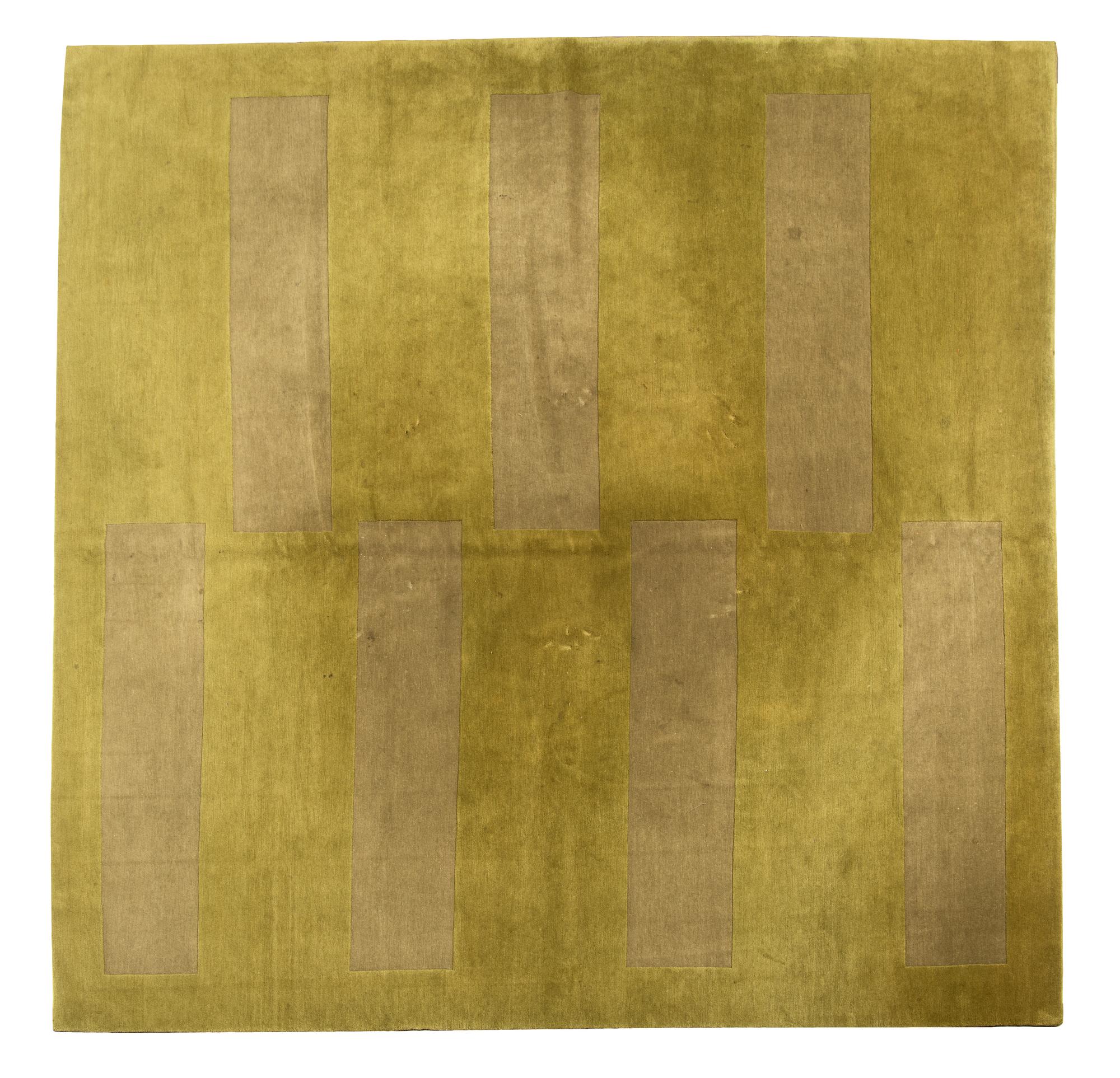A Two-Tone Green Wool Area Rug