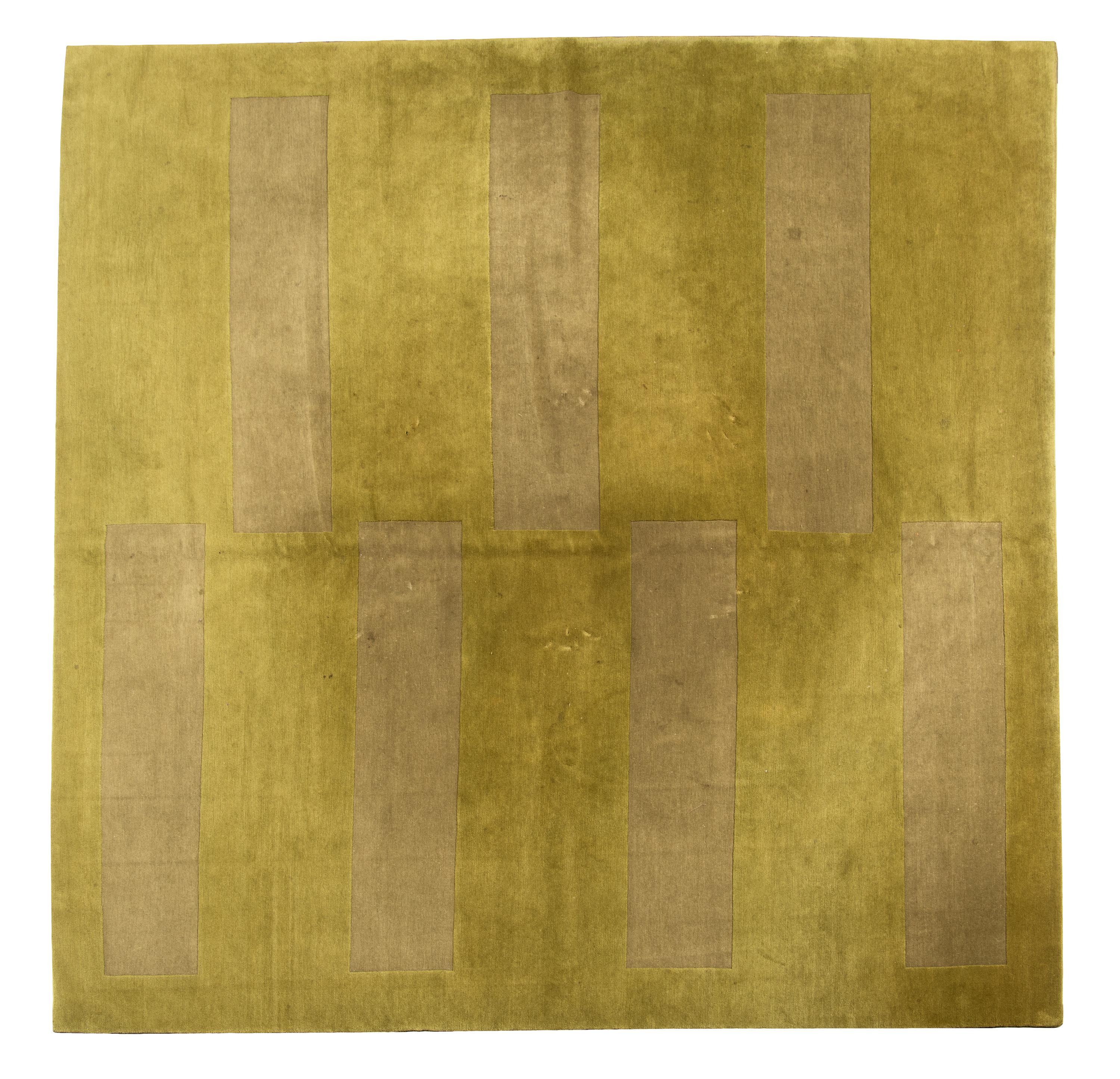 A Two-Tone Green Wool Area Rug