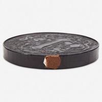 A Chinese circular ink cake 圆形墨饼