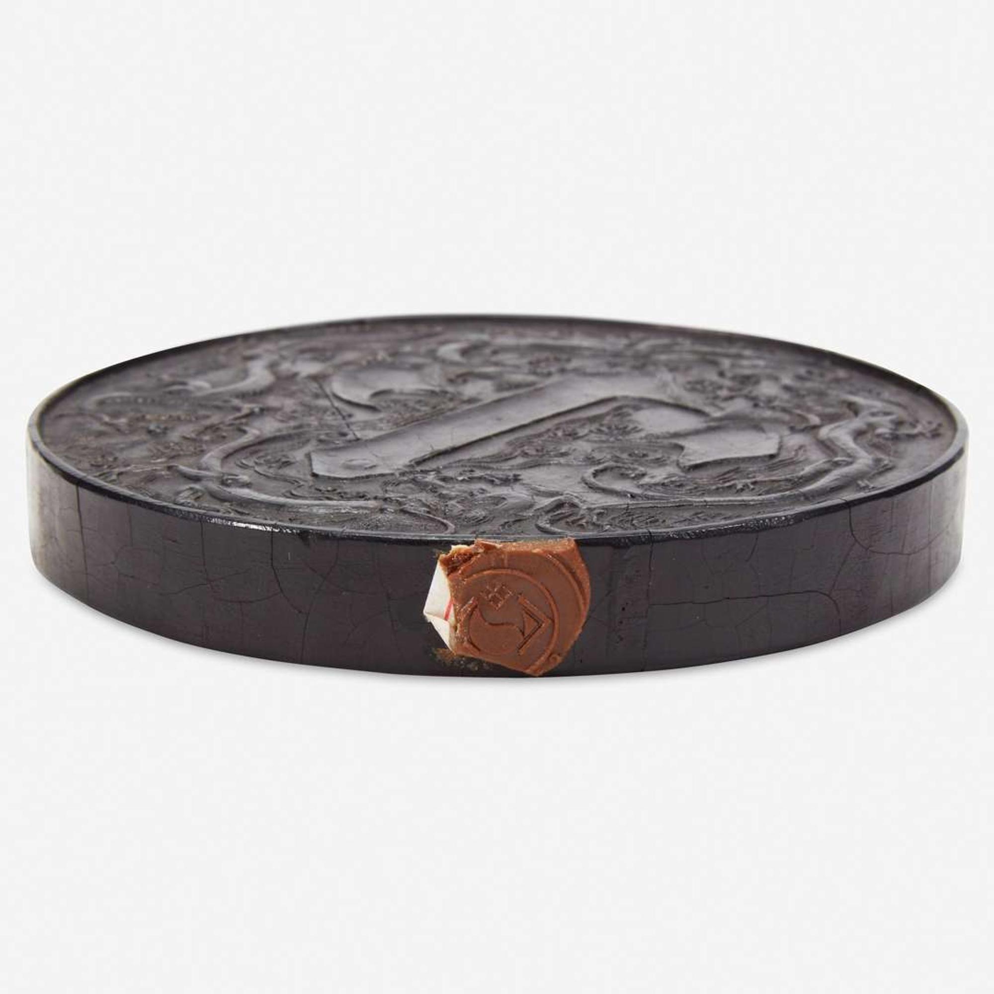 A Chinese circular ink cake 圆形墨饼
