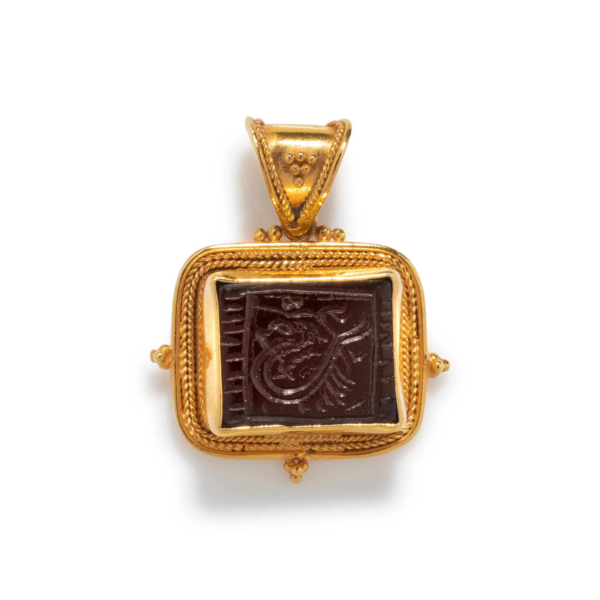 HIGH KARAT GOLD AND SARDONYX INTAGLIO PENDANT