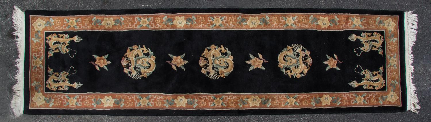 A Chinese Wool Runner 10 feet 2 inches x 2 feet 10 inches. — SECOND HALF 20TH CENTURY