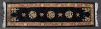 A Chinese Wool Runner 10 feet 2 inches x 2 feet 10 inches. — SECOND HALF 20TH CENTURY