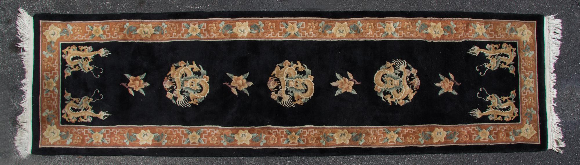 A Chinese Wool Runner 10 feet 2 inches x 2 feet 10 inches. — SECOND HALF 20TH CENTURY
