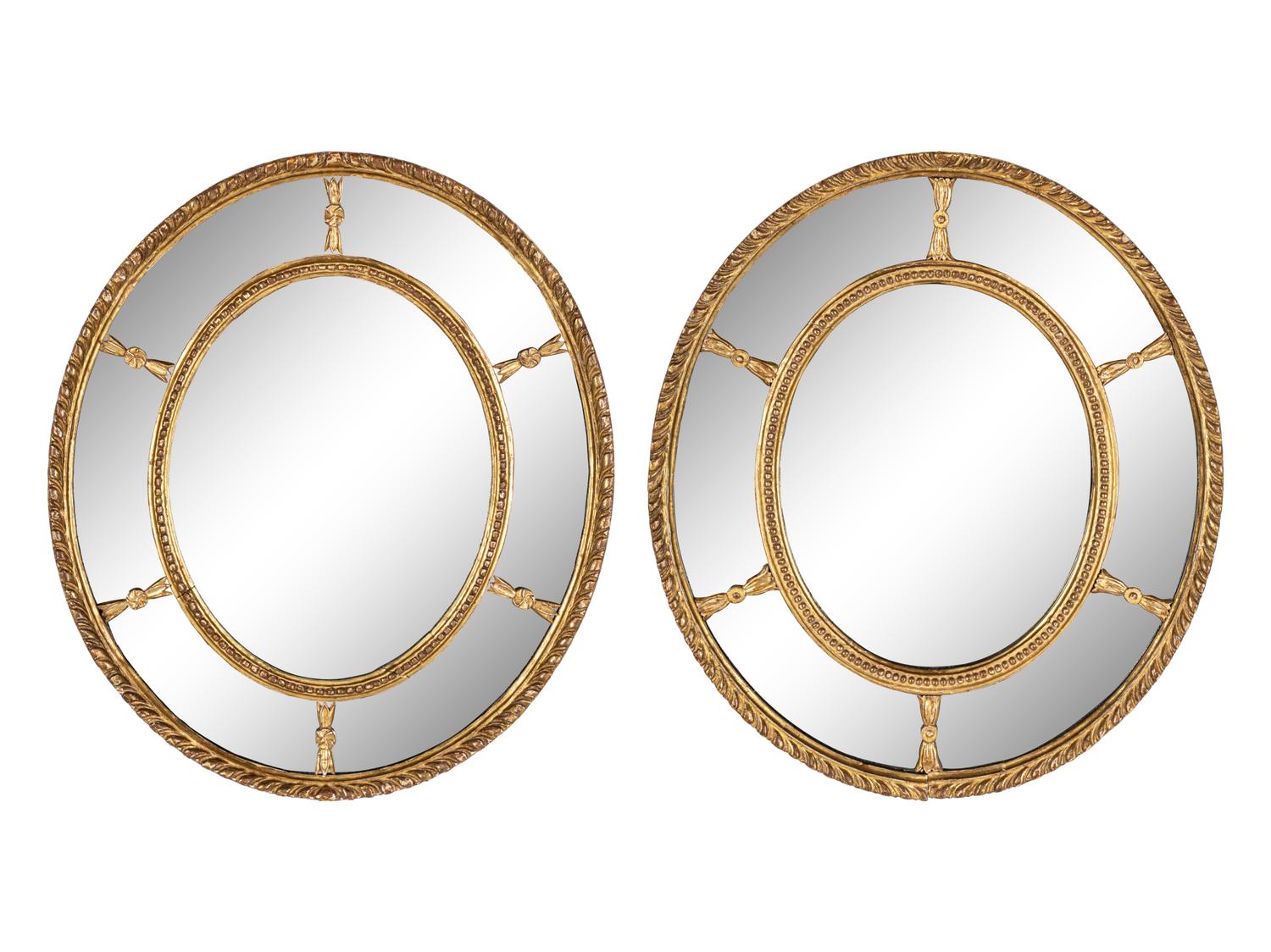 A Near Pair of George III Giltwood Oval Mirrors