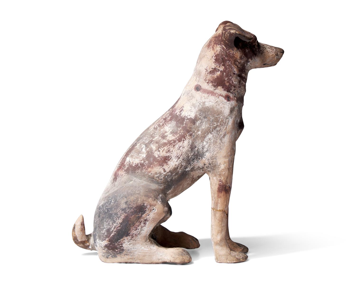 A Painted Terracotta Figure of a Dog
