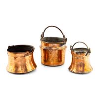 A Set of Three Copper Pails