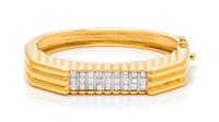 An 18 Karat Yellow Gold, Platinum and Diamond Bangle Bracelet, 34.00 dwts.