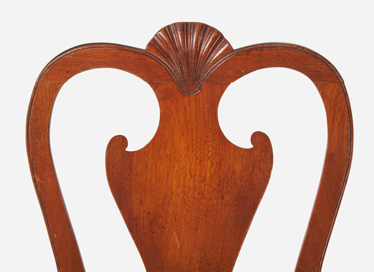 A Queen Anne carved walnut balloon seat side chair, Ireland, circa 1725