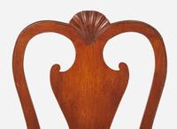 A Queen Anne carved walnut balloon seat side chair, Ireland, circa 1725