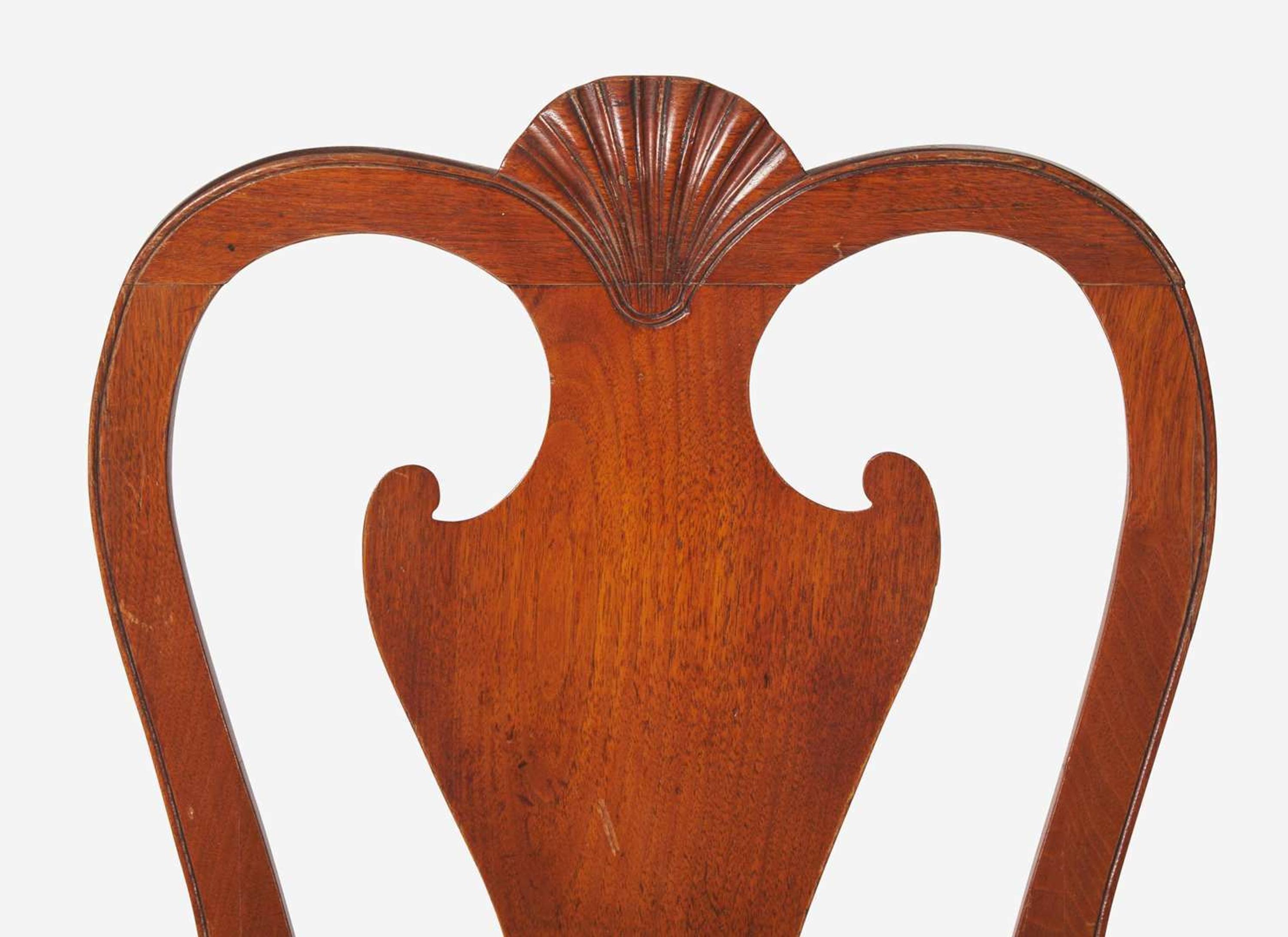 A Queen Anne carved walnut balloon seat side chair, Ireland, circa 1725