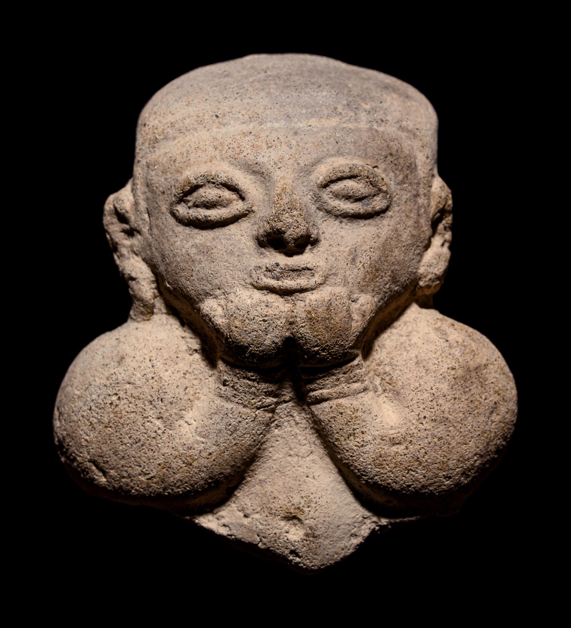 A Group of Ten Tumaco Terracotta Heads