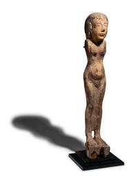 An Egyptian Wood Female Figure