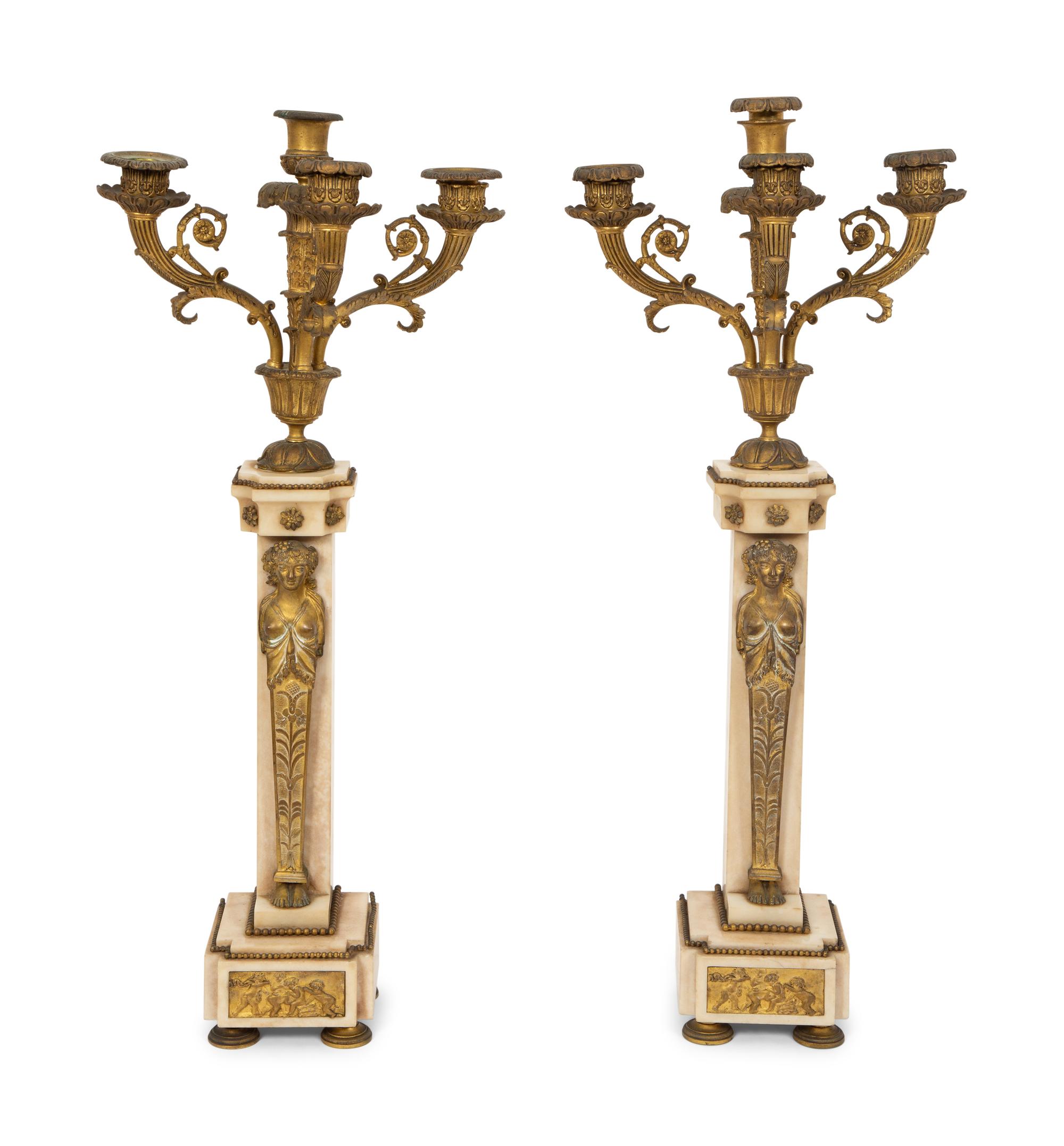 A Pair of Louis Philippe Gilt Metal and Marble Four-Light Candelabra