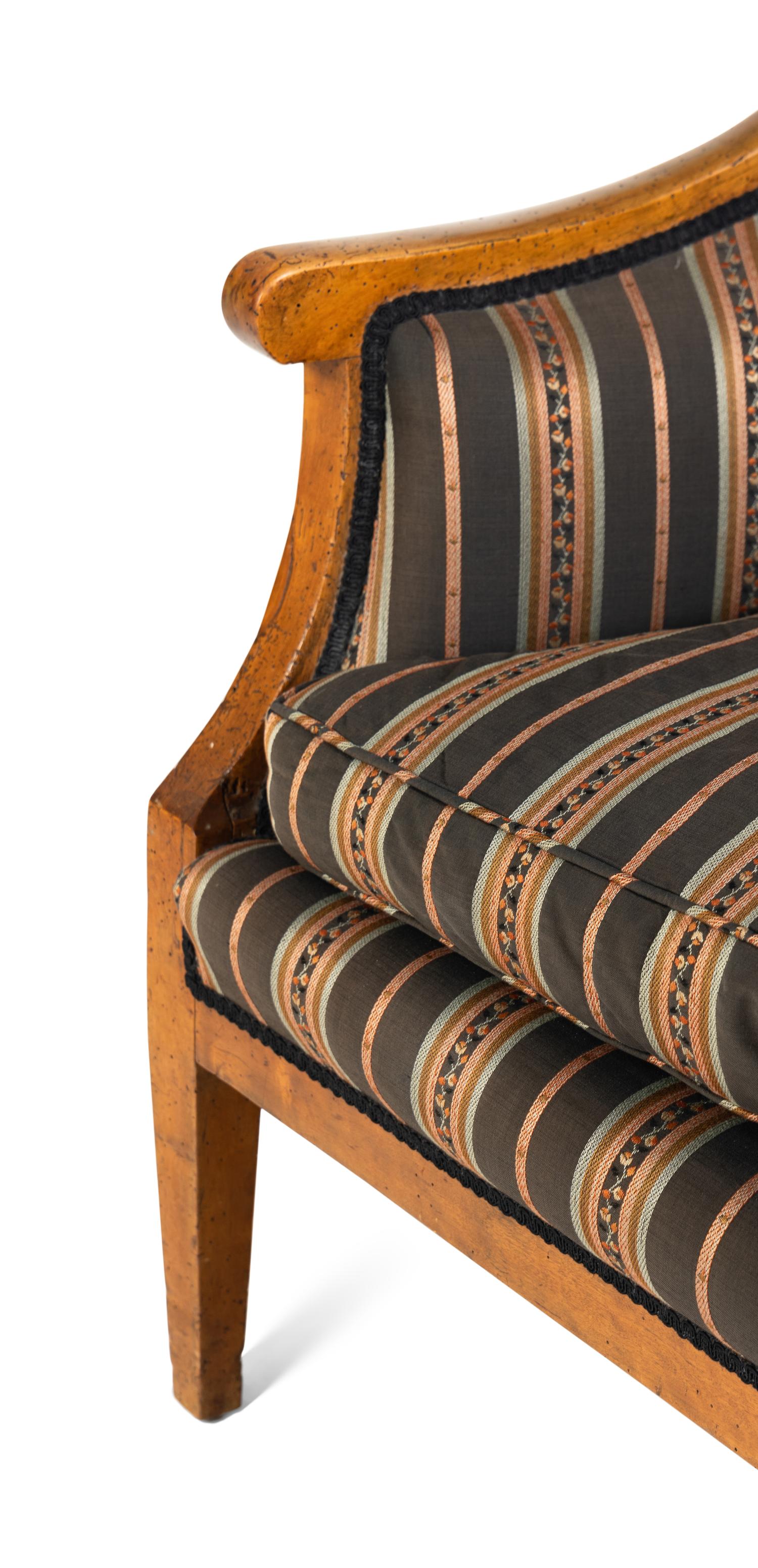 A Biedermeier Birch Armchair