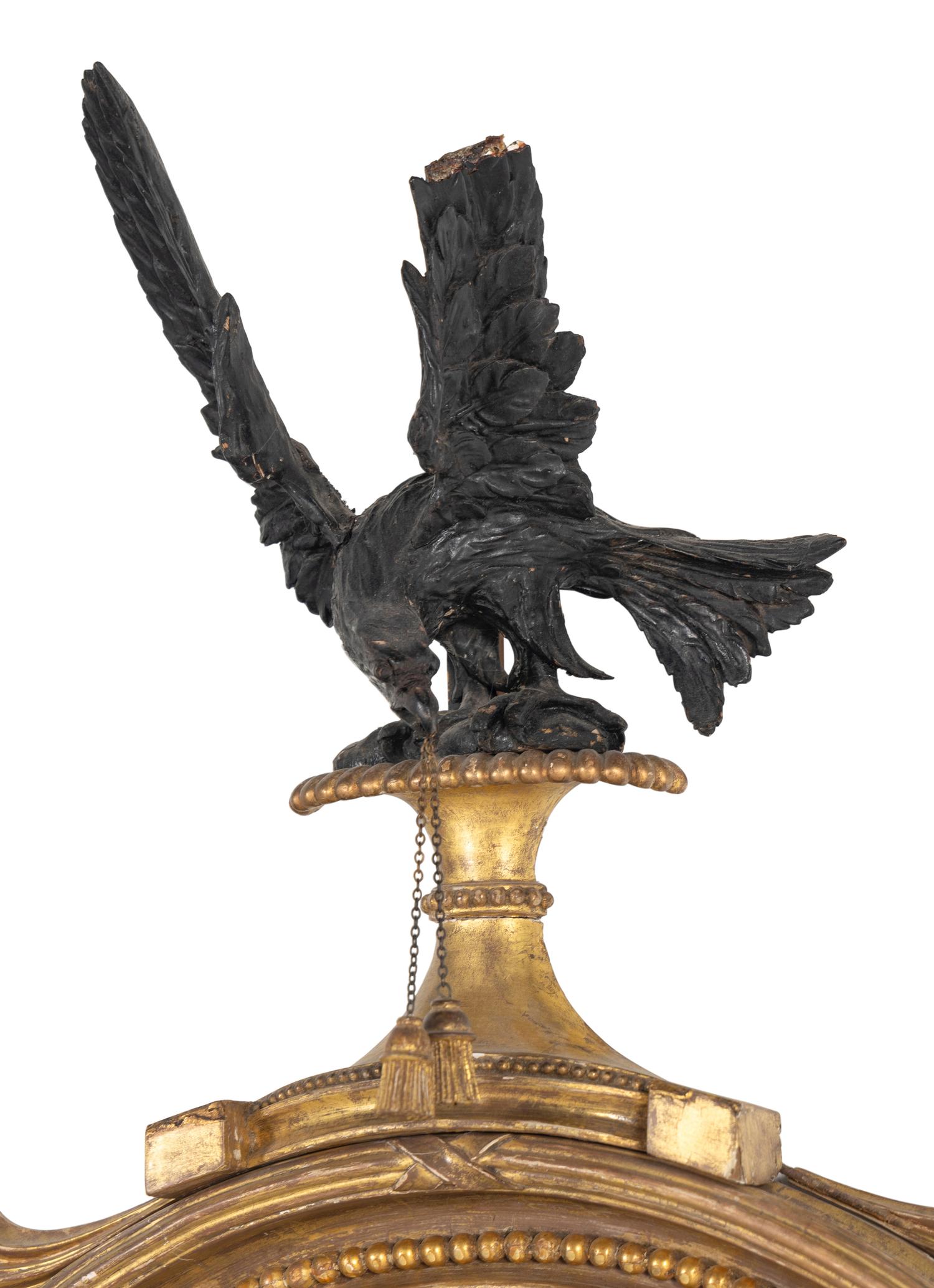 A George III Giltwood and Parcel-Ebonized Girandole Mirror