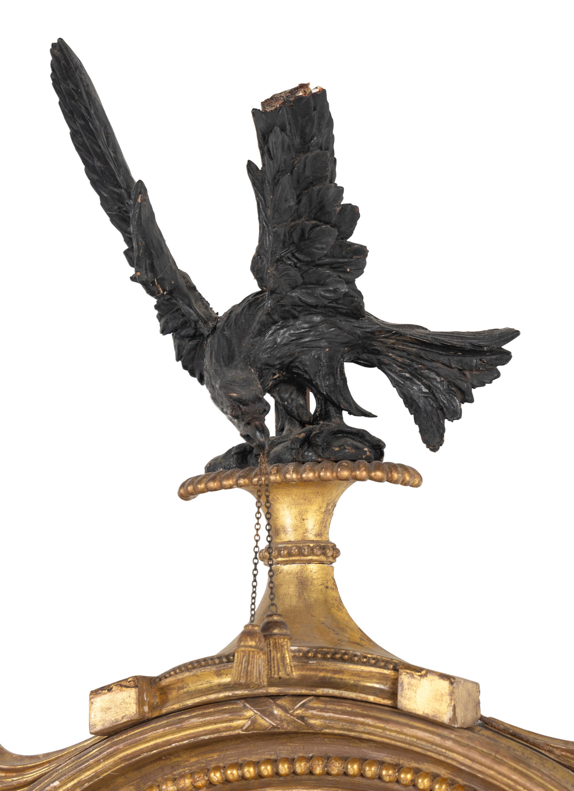 A George III Giltwood and Parcel-Ebonized Girandole Mirror