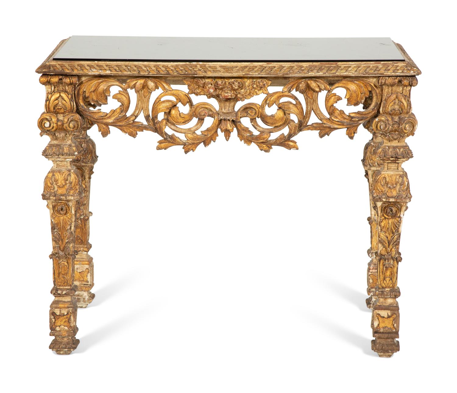 A Regence Style Giltwood Console Table with Black Glass Inset Top