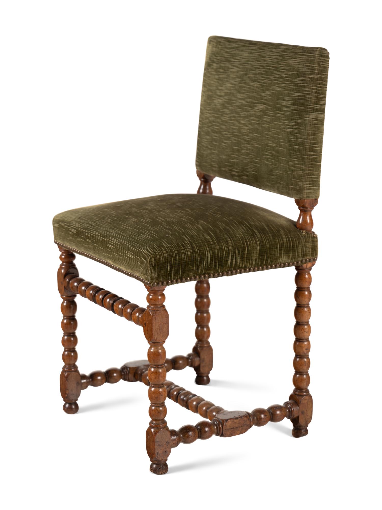 A Louis XIII Carved Walnut Side Chair