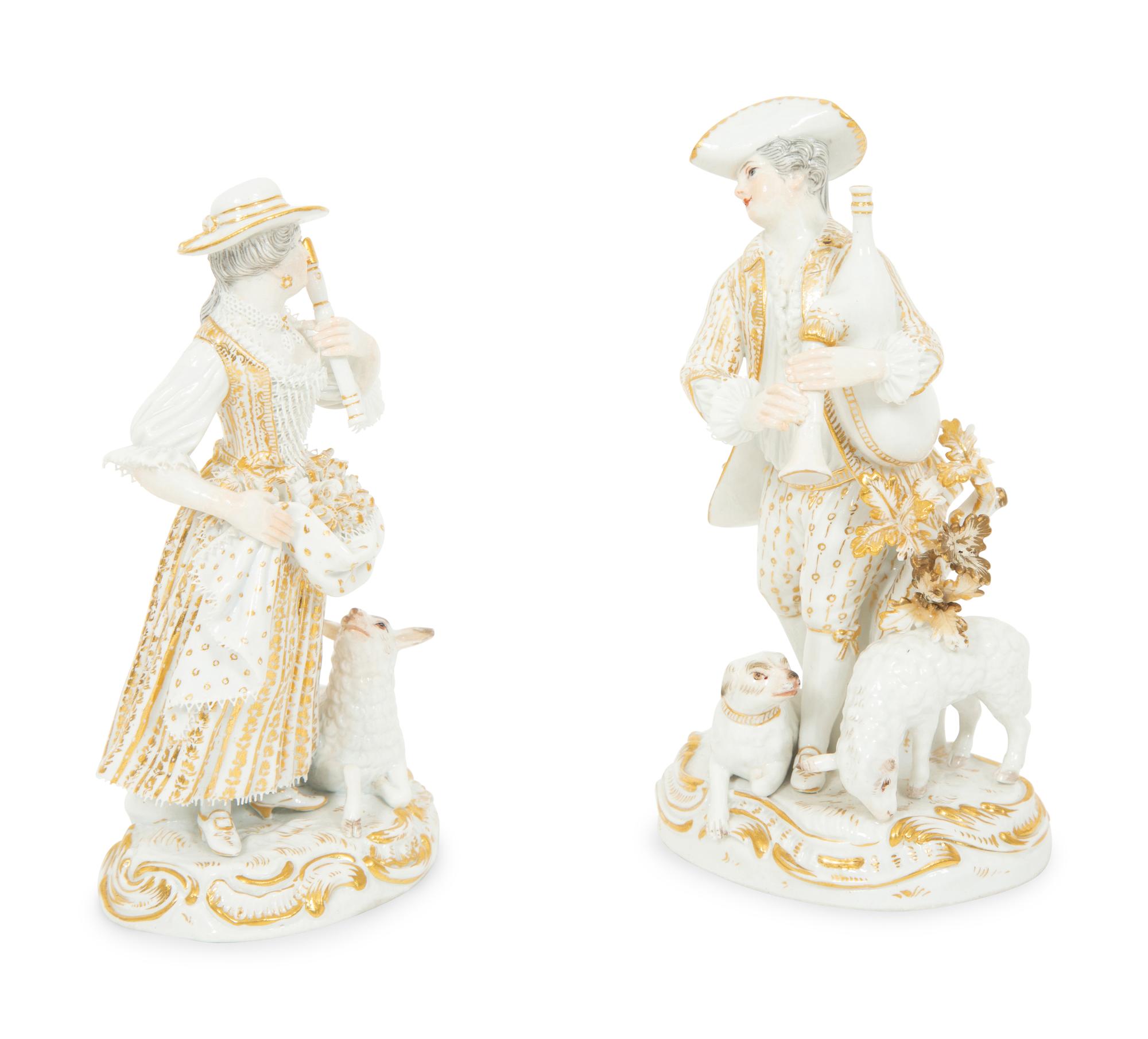 A Pair of Partial Gilt Meissen Porcelain Figures of a Man and Woman