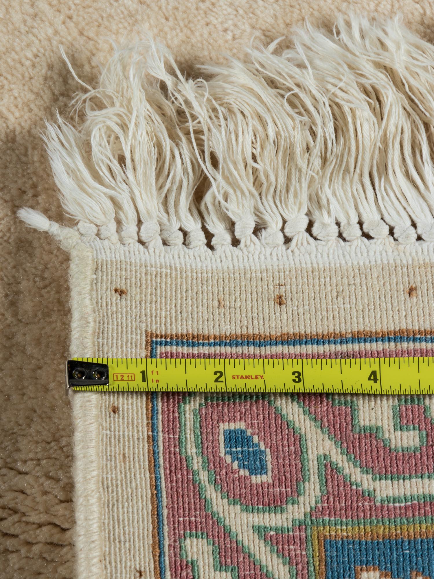 A Kirman Wool Rug