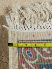 A Kirman Wool Rug