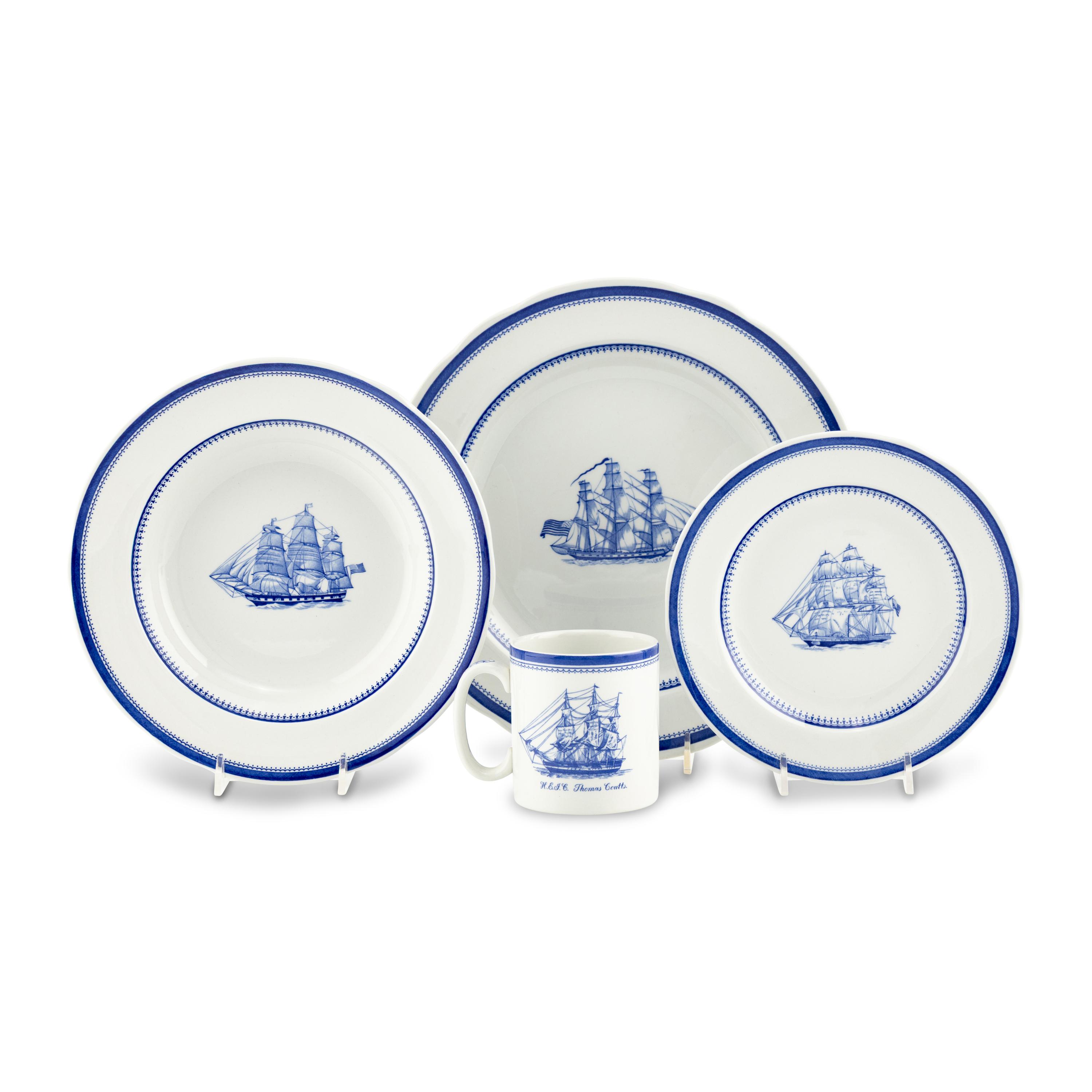 A Spode Porcelain Dinner Service for Twelve in the Blue Clipper Pattern