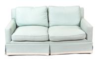 A Contemporary Blue Upholstered Two-Cushion Loveseat — 20TH CENTURY