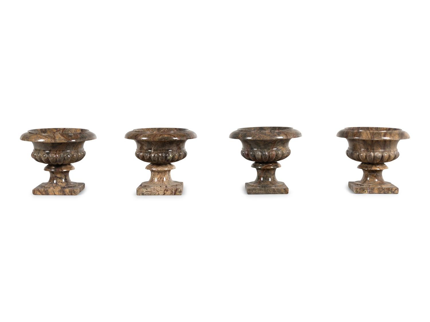 Four Continental Marble Urns